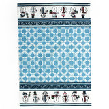 blue christmas tea towel with blue geometric pattern and snowman designs on a white background