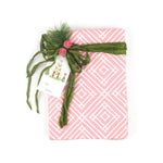 a wrapping paper with a geometric lattice pattern in pink
