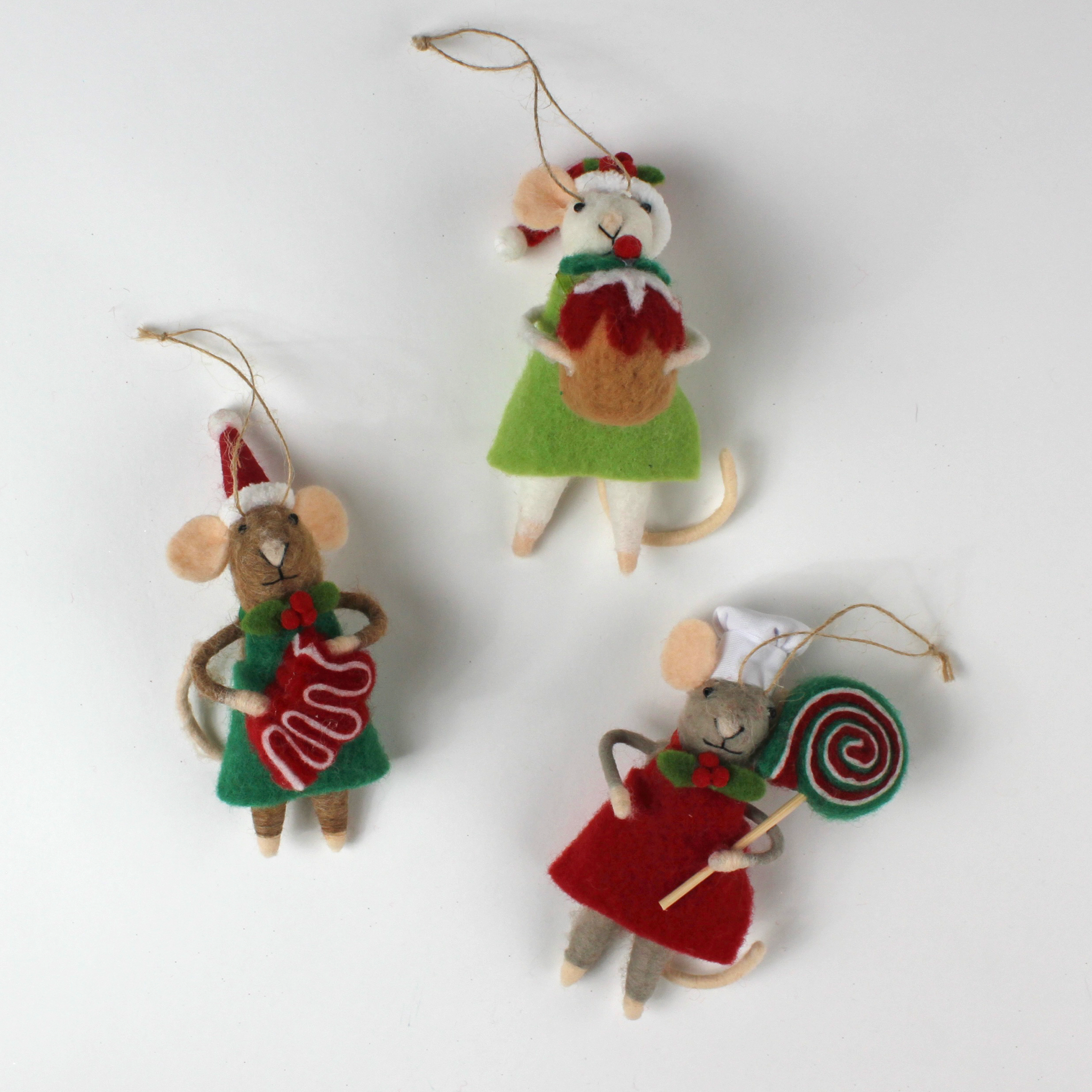 Three festive felt mouse ornaments wear holiday outfits—one holds a gingerbread cookie, another a giant lollipop, and the third a Christmas pudding