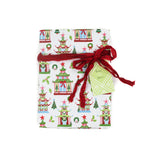 Front of a pagoda-themed Christmas wrapping paper with festive green, red, and white pattern.