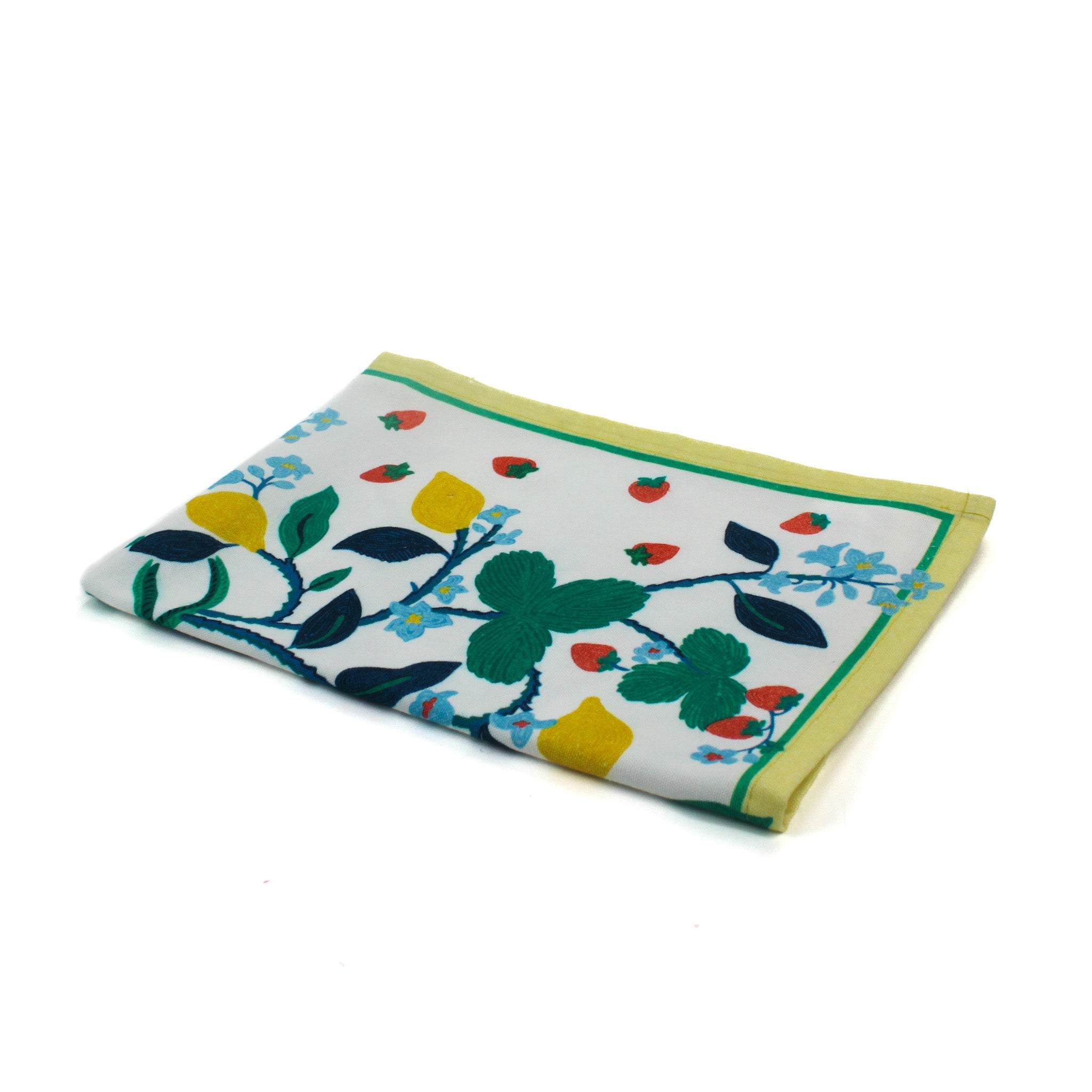 a lemon and strawberry tea towel with blue flowers and a yellow and green border against a white background. 