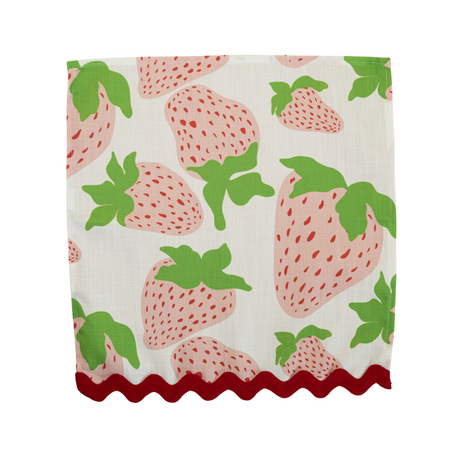 a strawberry fabric napkin with large pink strawberries and red ric rac trim