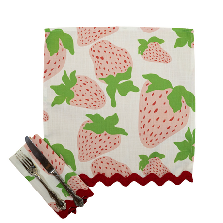 madcap cottage garden party strawberry napkins, one unfolded and one folded with cutlery on top