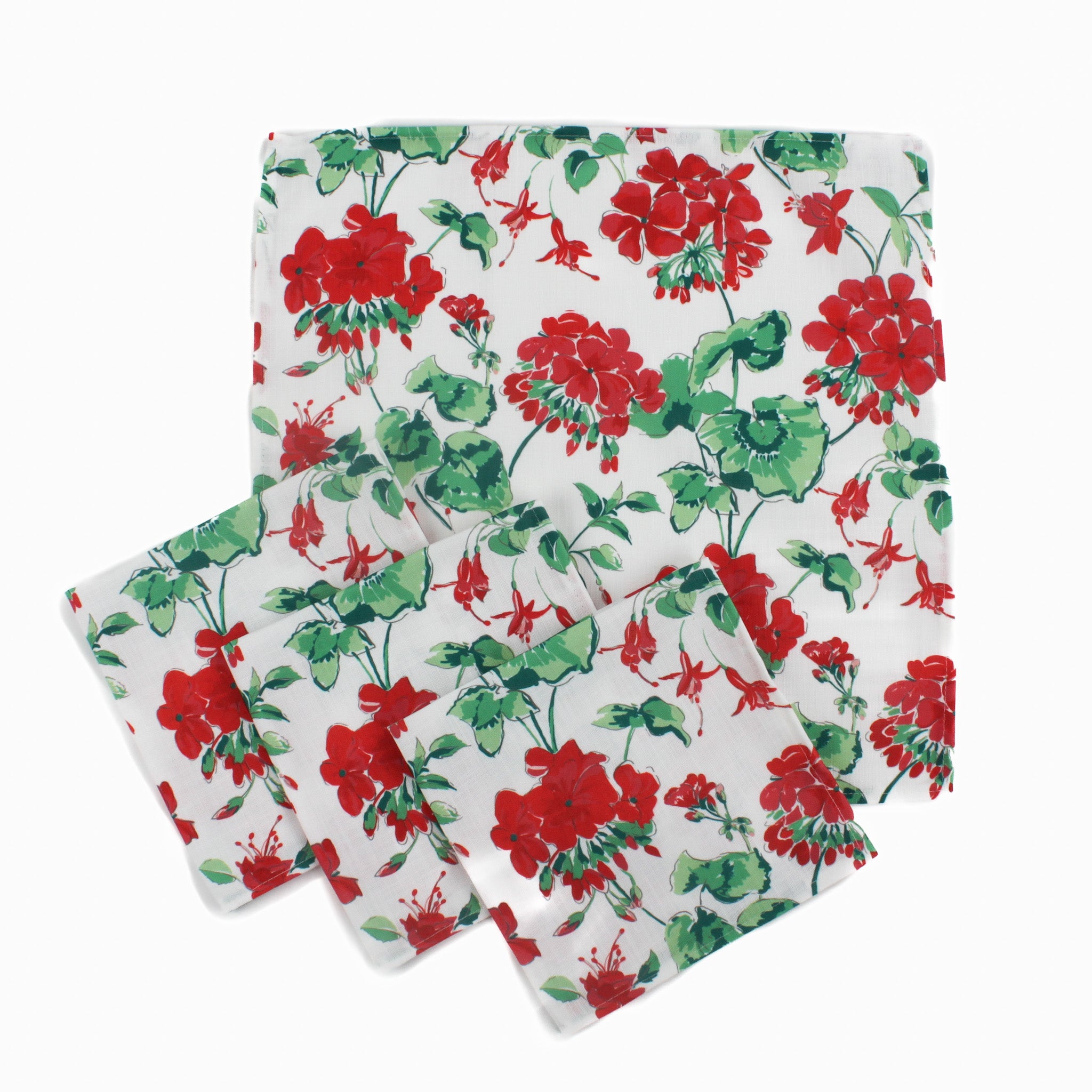 Set of red geranium floral tea towels with green leaves on a white background, classic kitchen linens perfect for Christmas tea towel styling, holiday entertaining, and seasonal home décor