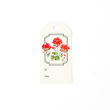 Elegant gift tags featuring vibrant red geranium flowers, lush green leaves, decorative borders, and personalization fields.