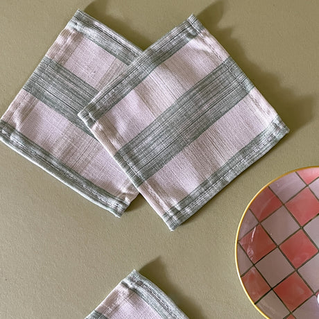 Gin Lane gingham cloth cocktail napkins in Meadow green with a checkerboard dish