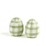 a pair of green gingham decorative Easter eggs on white background