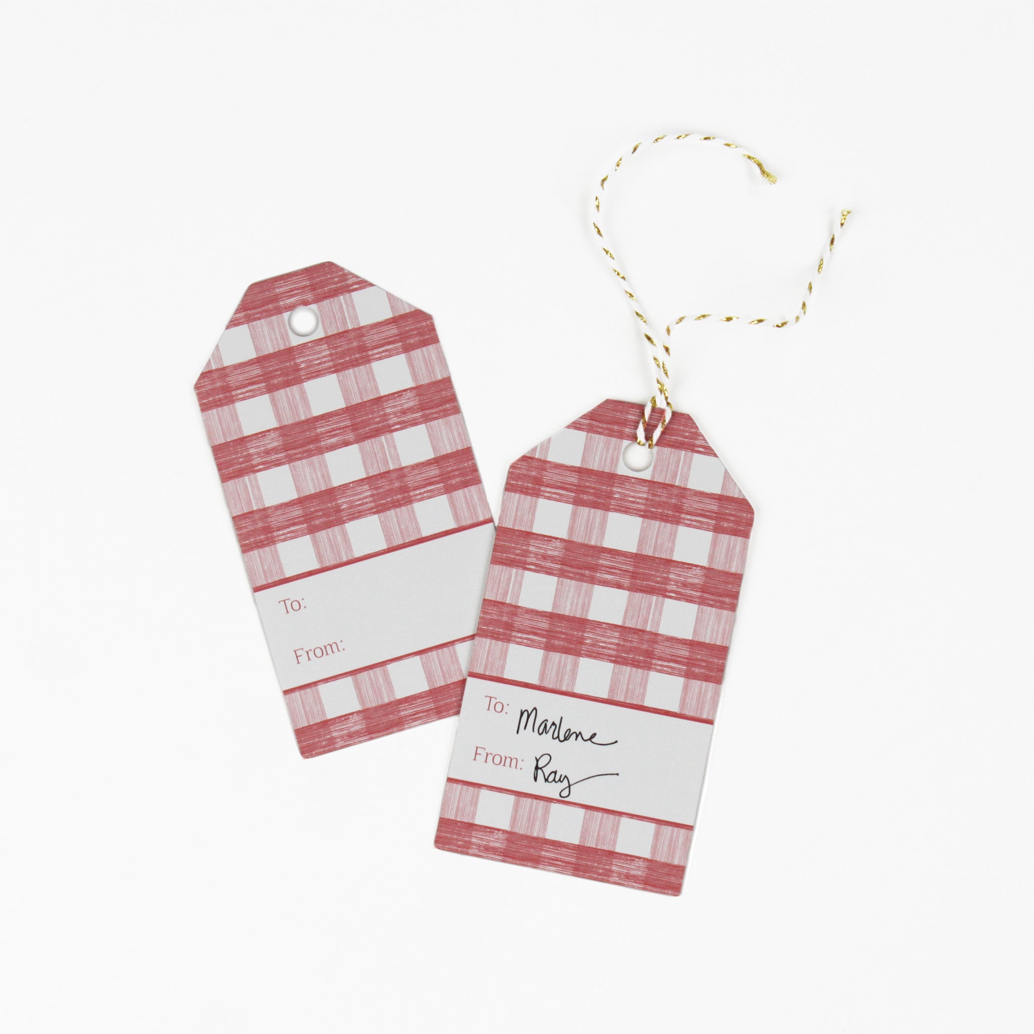 A pink gingham patterned gift tag with a white space for personalization, displayed on a white background.