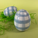 two blue gingham large decorative easter eggs with grass