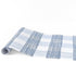 Gingham blue paper table runner with classic blue and white checkered pattern.
