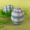 two blue gingham large decorative easter eggs with grass