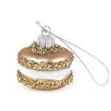 glittery class chocolate macaron ornaments on a white background 