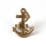 metal anchor napkin ring on a white background. 