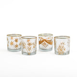 Four glass candle holders with gold floral designs on a white background