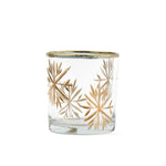 Clear glass candle holder with gold snowflake design on a white background