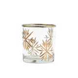 Clear glass candle holder with gold snowflake design on a white background