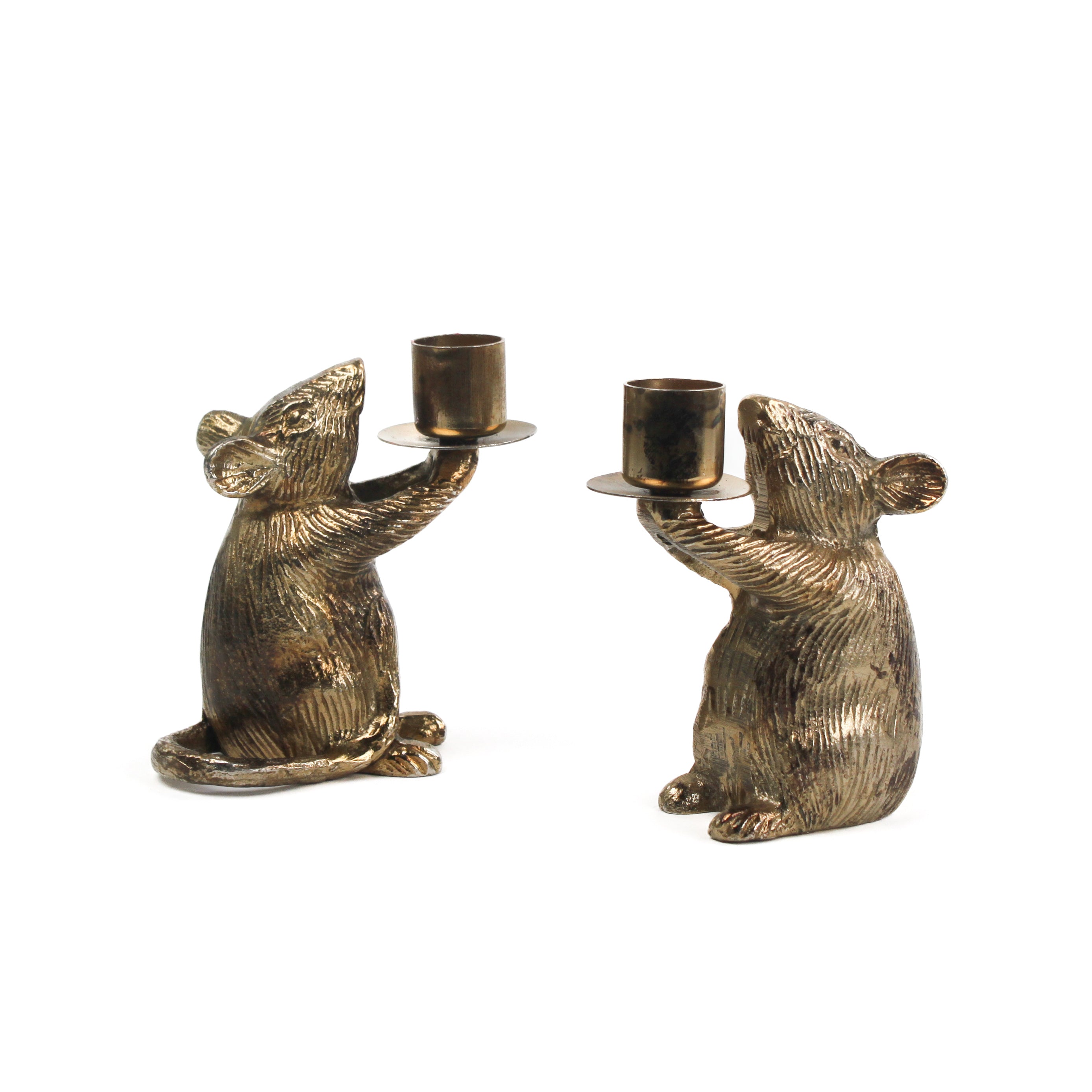Two gold mouse candle holders on a white background