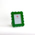 5 x 7 Green scalloped photo frame on a white background