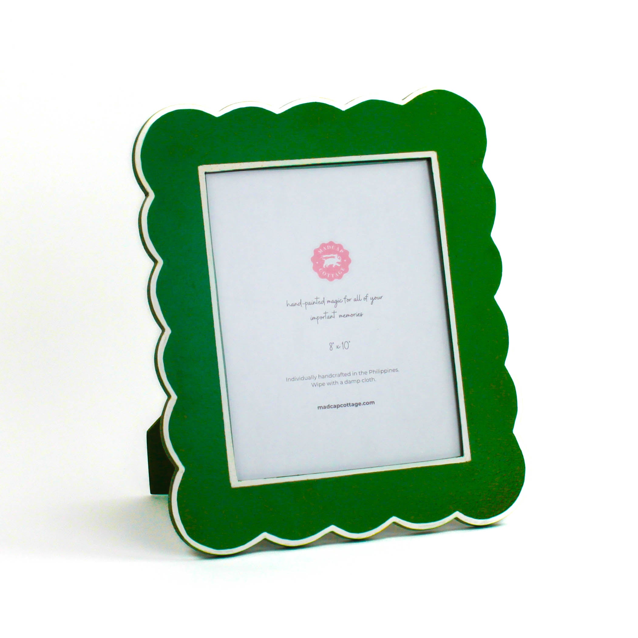 Green 8 x 10 scalloped photo frame on a white background