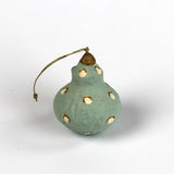 Single Painted Paper Mache Christmas Ornament Green with white polka dots and gold top.