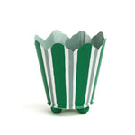 Green and white striped tole cachepot with scalloped rim and rounded green feet, standing upright.