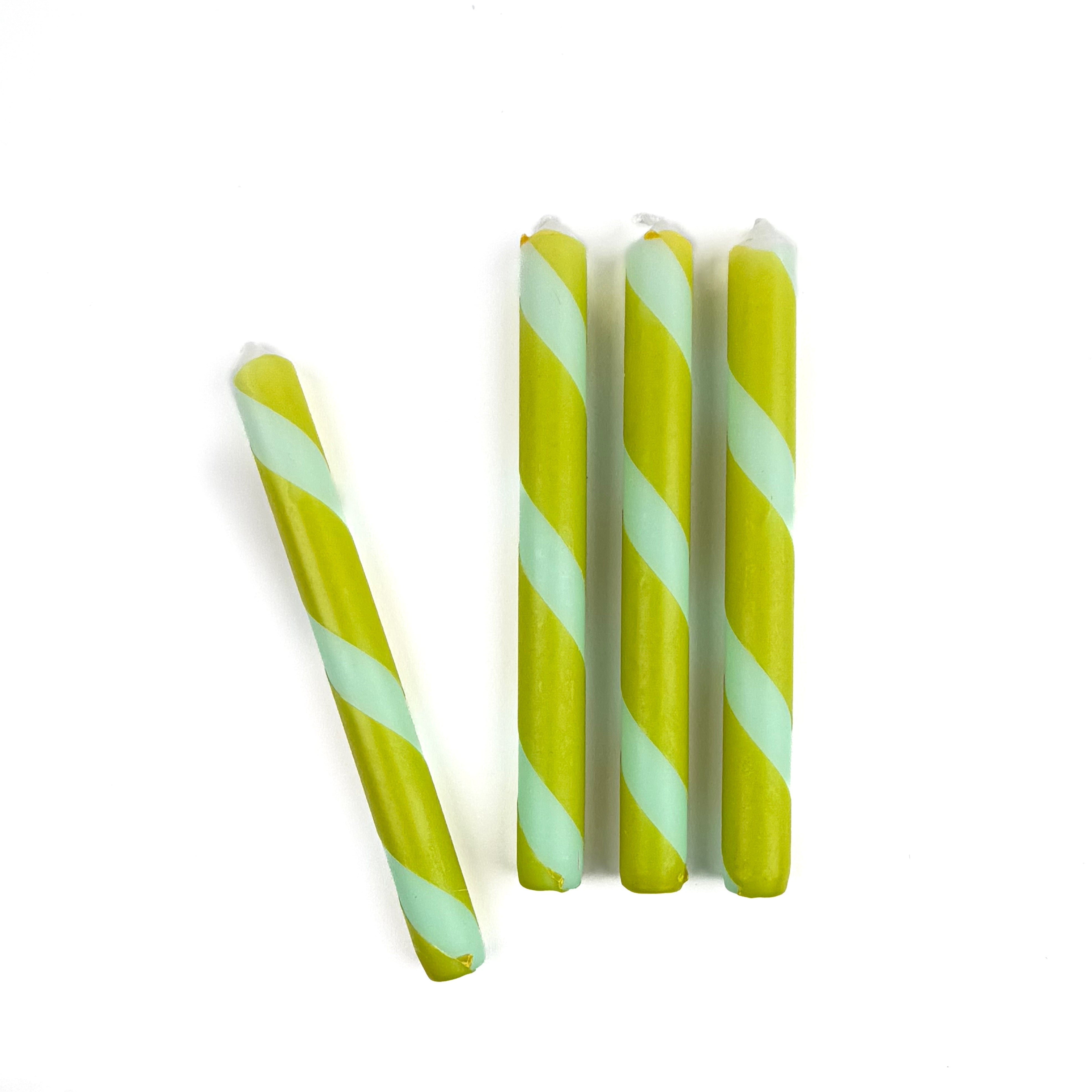 Green and blue candy stripe taper candles set with twisted spiral design for spring table decor.