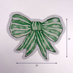 Green bow shaped Christmas paper placemat with ribbon design, 18 by 14 inches, Christmas tea towel