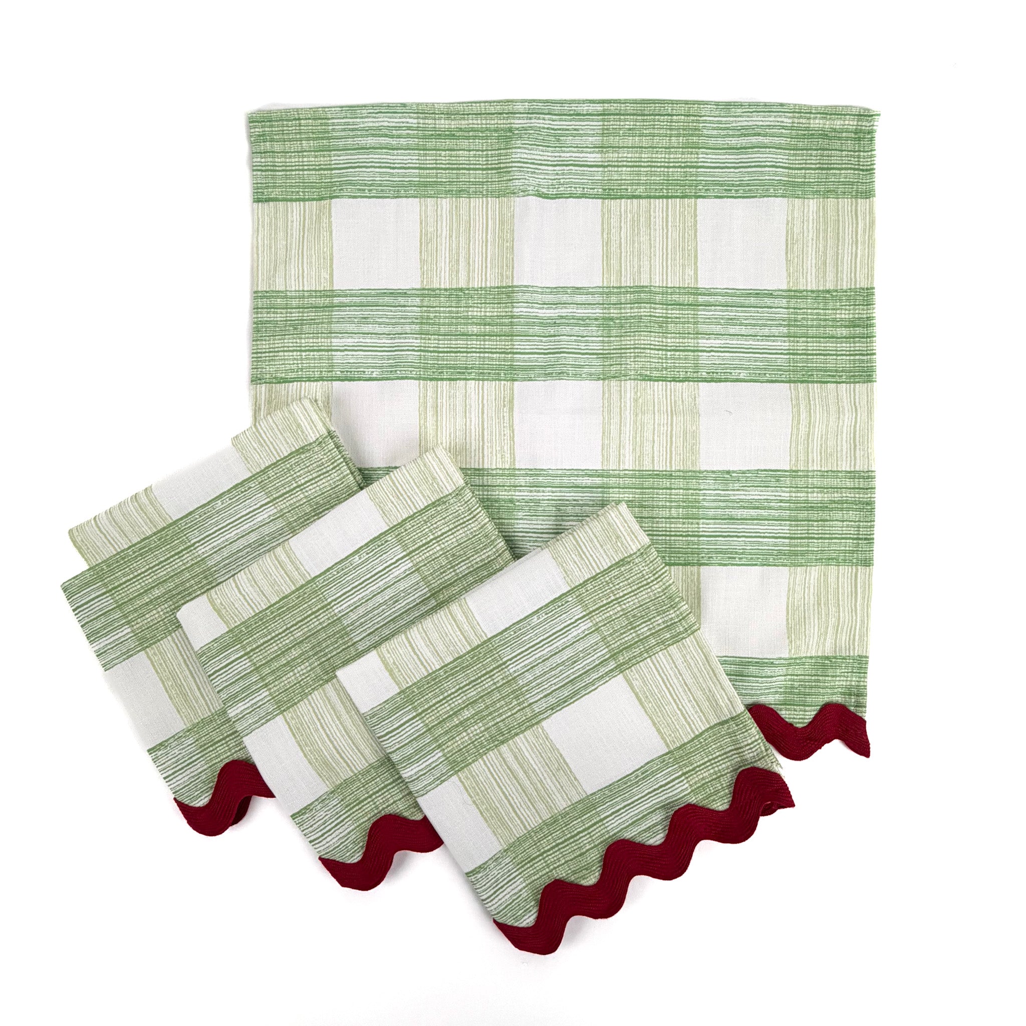 Set of green striped napkins with textured horizontal pattern and scalloped edge on a white background, classic table linens perfect for Christmas tea towel styling, holiday entertaining, and seasonal home décor