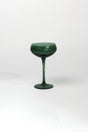 a green coupe glass on a white background from madcap cottage