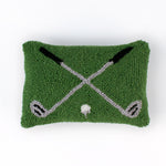 Rectangular green decorative pillow with a hooked texture, featuring two crossed golf clubs and a small white golf ball in the center.
