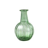 Green glass vase on a white background