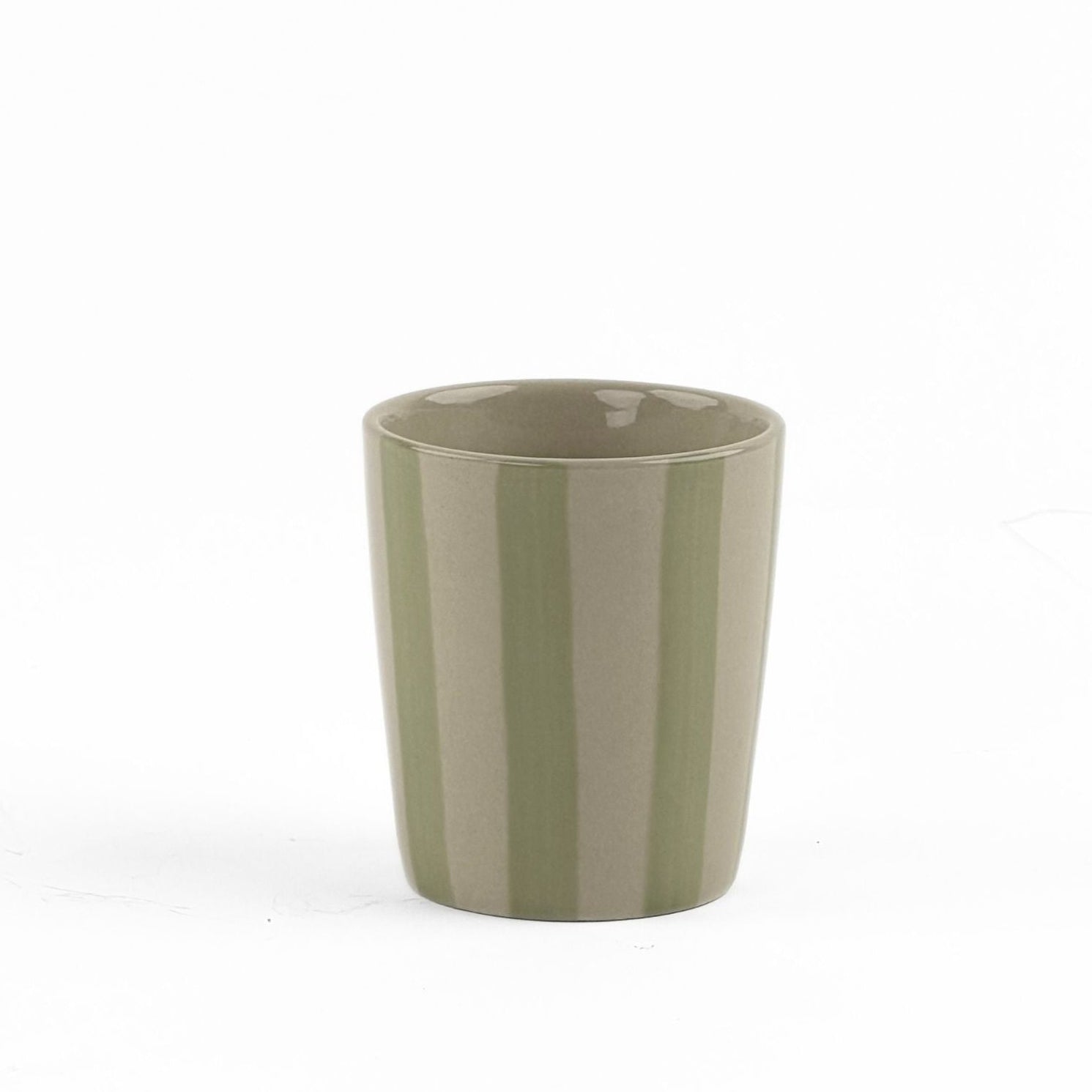 A green striped ceramic cup on a white background. 