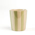 A green striped ceramic cup in on a white background. 