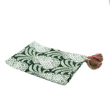 a green pineapple tea towel with pink and green tassels against a white background 