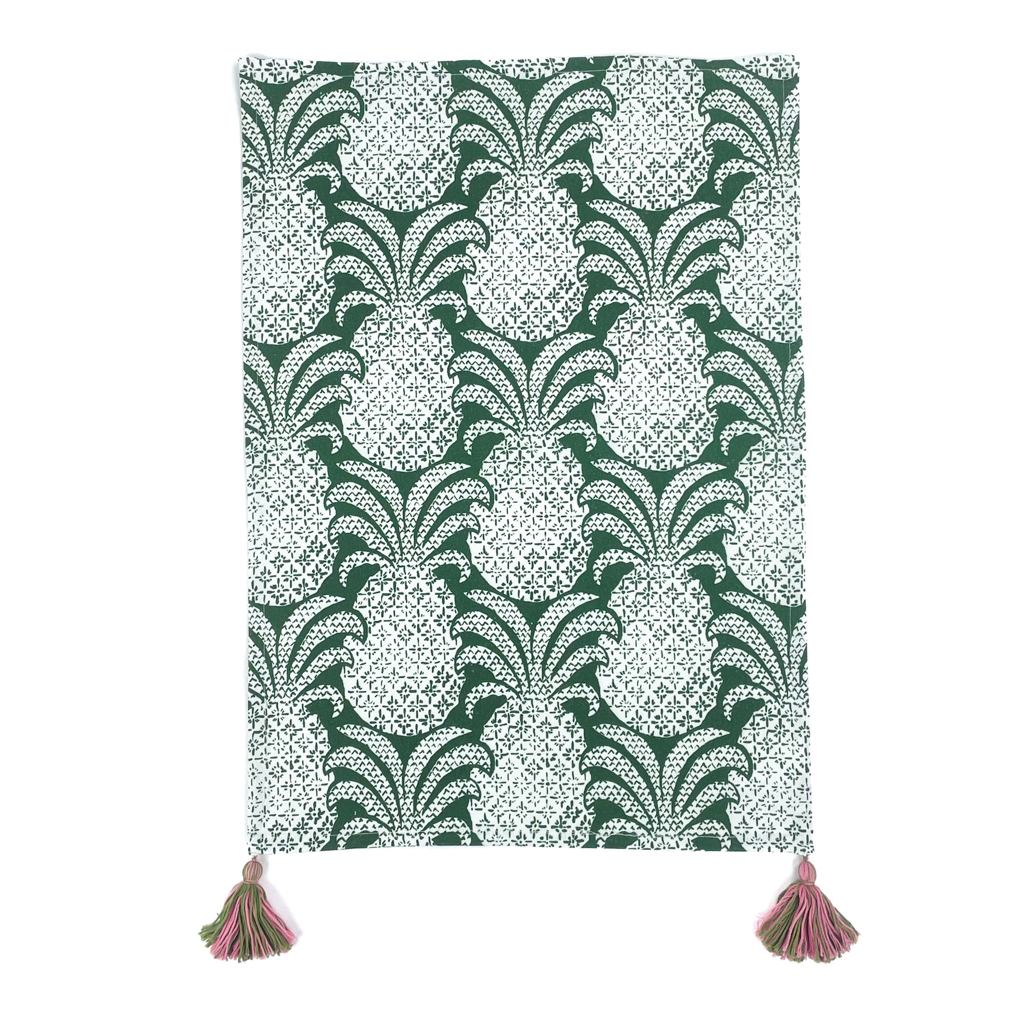 a green pineapple tea towel with pink and green tassels against a white background 