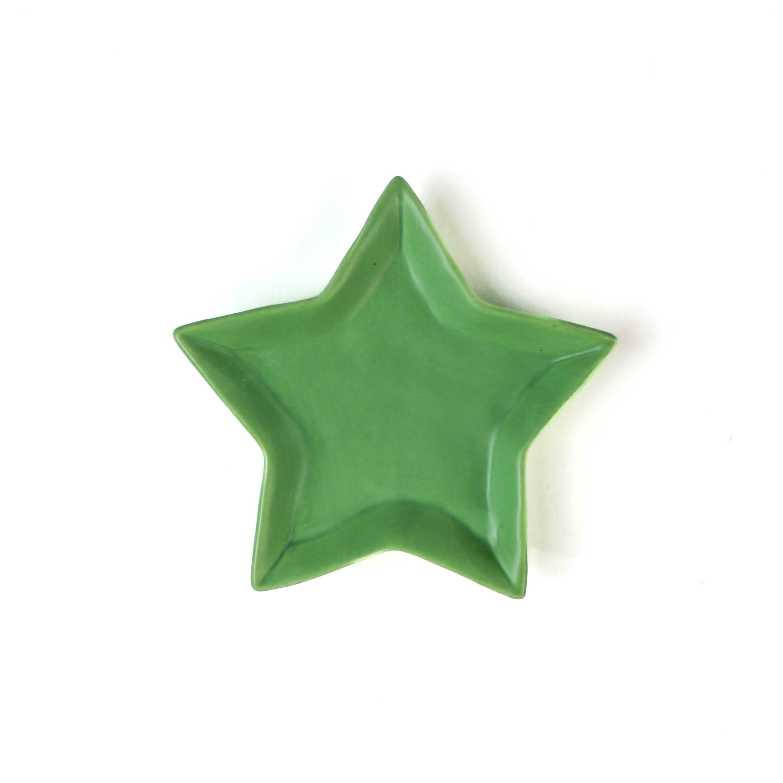 Green star-shaped bowl on a white background