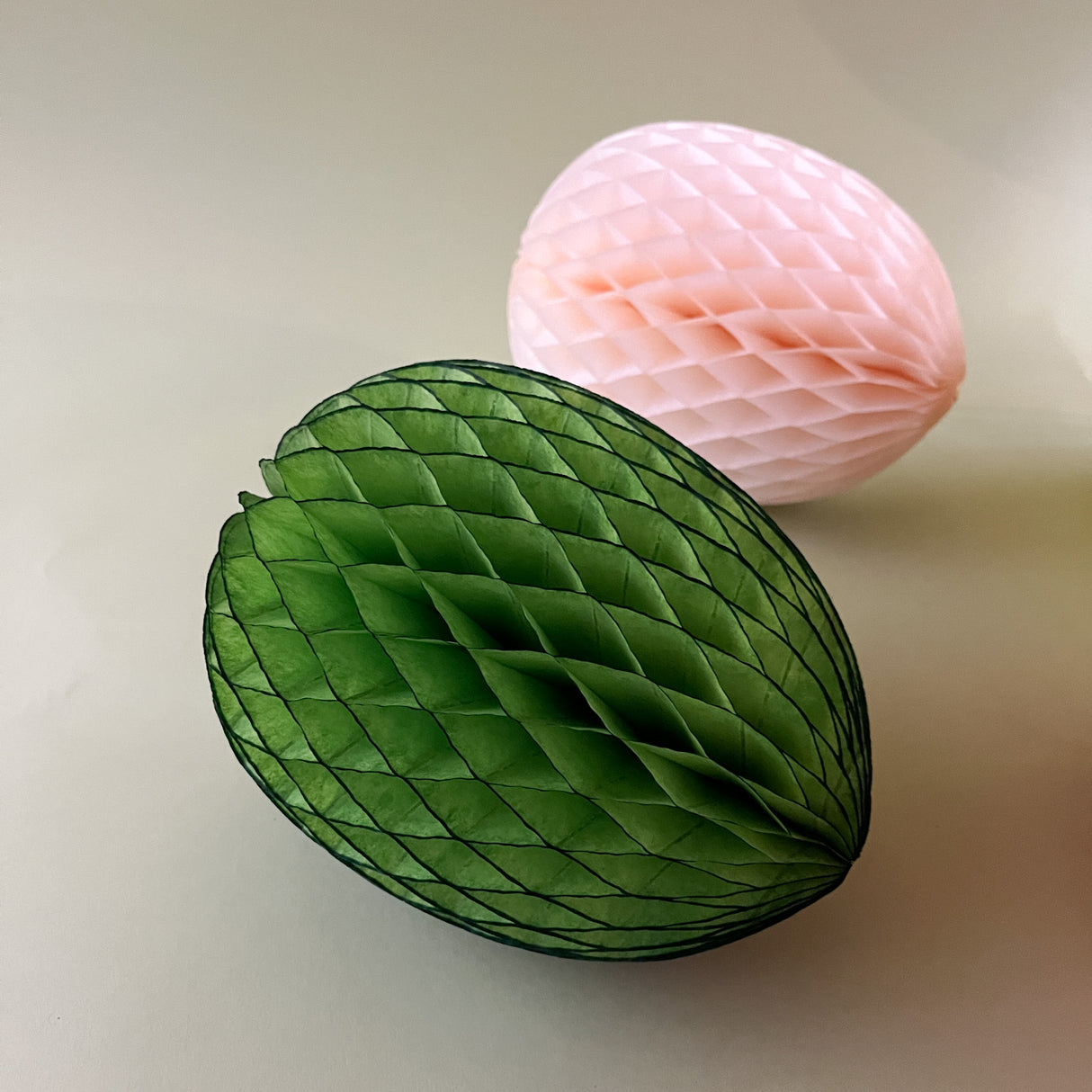 green and pink paper tissue eggs