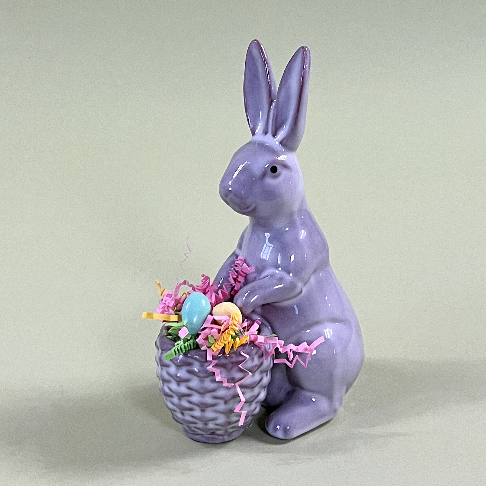 grey ceramic easter bunny with candy in basket