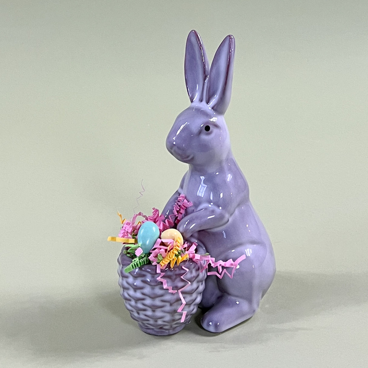 grey ceramic easter bunny with candy in basket