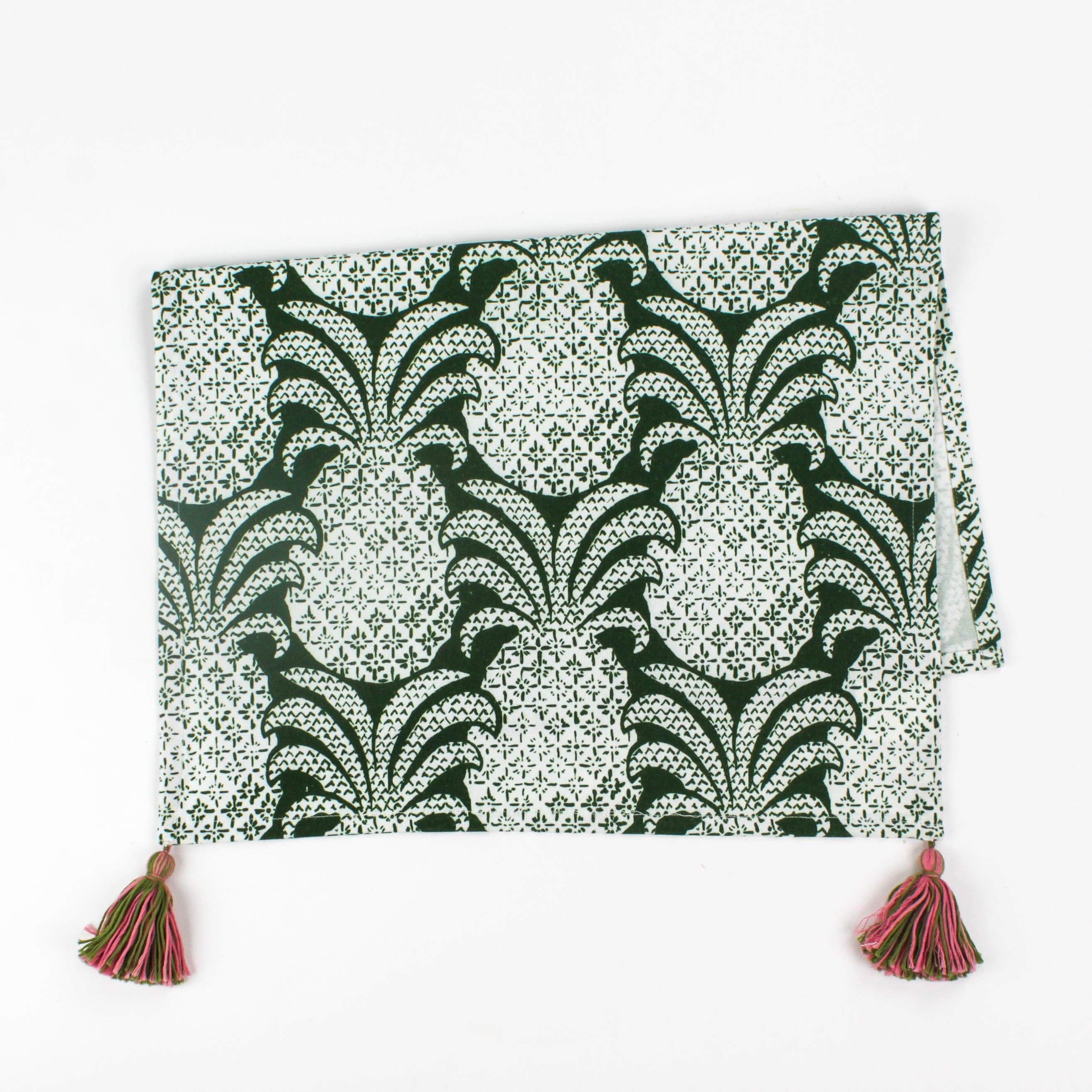 Green pineapple pattern Christmas tea towel with pink and green tassels on each corner