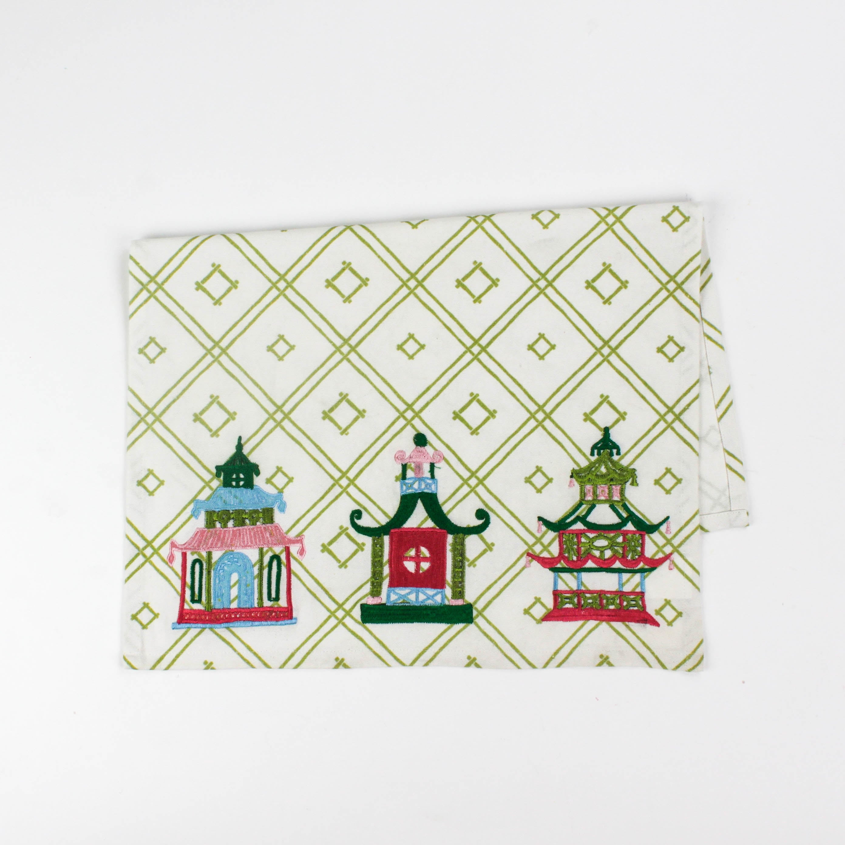 Christmas tea towel with three pagodas in red, green, pink, and blue tones, with a festive chinoiserie style.