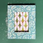 a Hampton Court hand painted photo frame on a green background