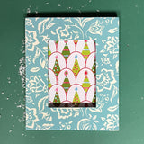 a Hampton Court hand painted photo frame on a green background