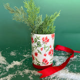 Hand-painted cup or vase with red geraniums and a red band around the base