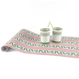 Harbor Trail pink and green striped paper table runner styled with decorative paper cups.