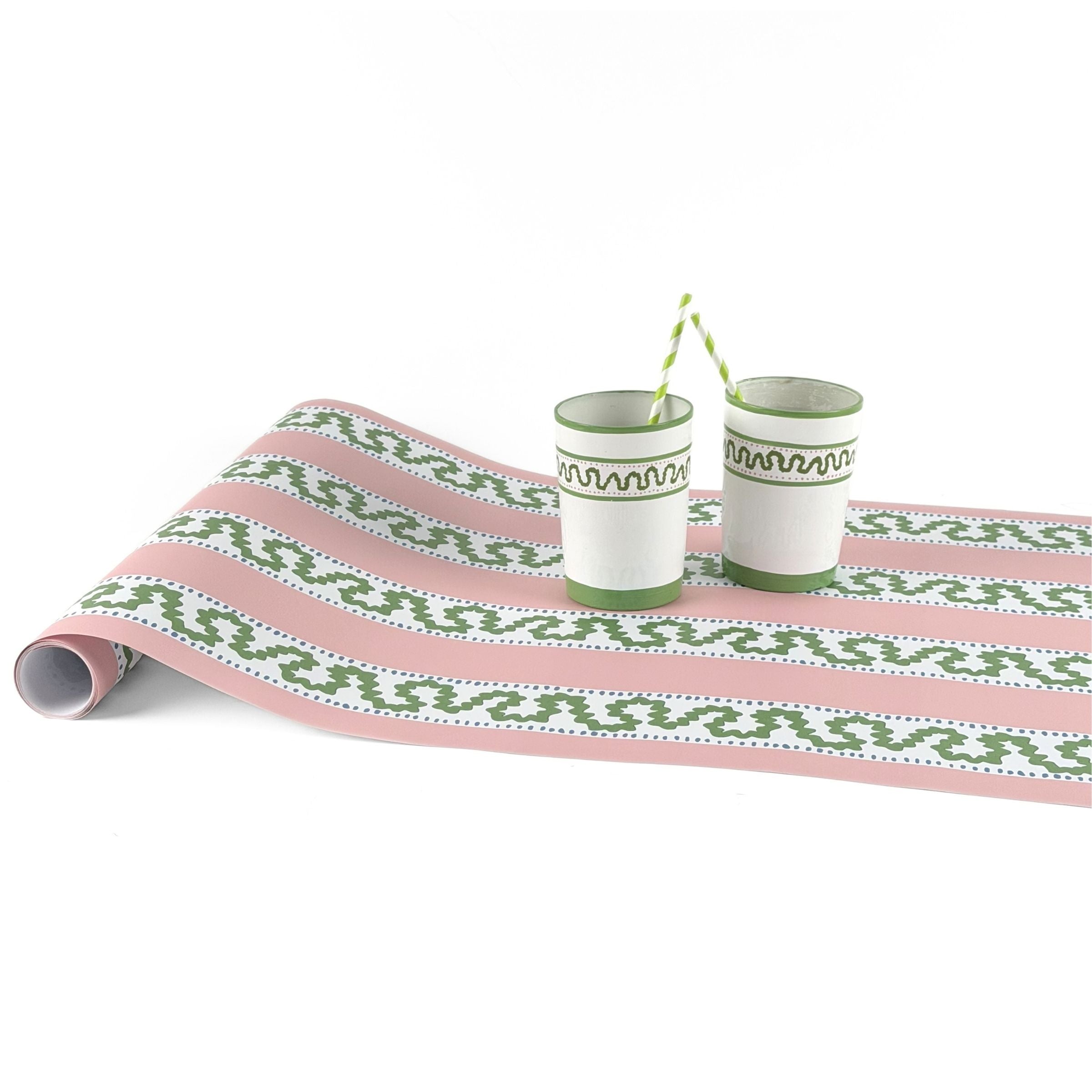 Harbor Trail pink and green striped paper table runner styled with decorative paper cups.