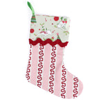 Decorative striped red and pink Christmas stocking with a green cuff with pugs on it on a white background