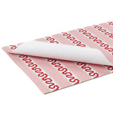 red and pink paper placemats featuring a striped pattern called harbor trail in a white background