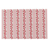 red and pink paper placemats featuring a striped pattern called harbor trail in a white background.