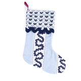 Blue Christmas stocking with blue and white striped pattern on a white background